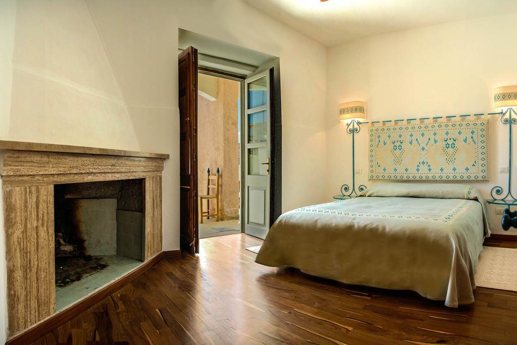 Omu Axiu Hotell Orroli Rum bild